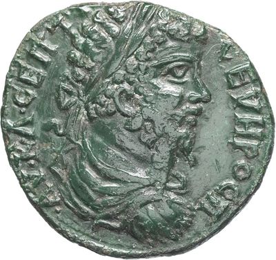 une pièce de monnaie romaine antique représentant la tête d'un homme coiffé d'une couronne