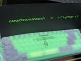 a black box with a green keyboard inside of it