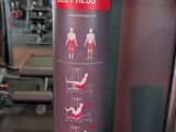 a picture of a gym equipment sign on a pole