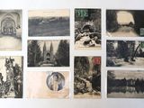 many old postcards on the wall of a room