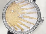 an image of a close up of a wrist watch with a sun dial