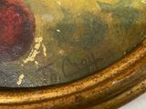 a painting of a red apple on a gold oval frame