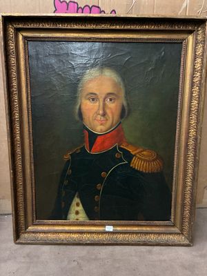 portrait d'un homme en uniforme militaire dans un cadre doré