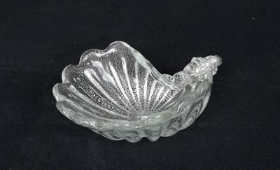an image of a clear glass bowl on a black background