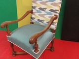 a chair that is sitting on a red floor
