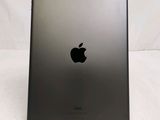 an apple ipad sitting on top of a table with a white background