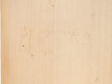 an old piece of paper with torn edges on a white background