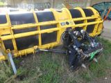 a yellow school bus that is parked in the grass