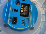 an image of a blue electronic device inside of a plastic container