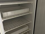 an open refrigerator with a lot of food inside of it