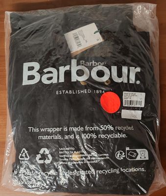 the barbour t - shirt is wrapped in plastic and ready to be shipped