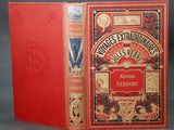 a red book with an ornate design on the cover