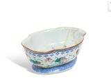 a small bowl that has a blue and white design on it