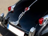 a close up of a black car with chrome trims