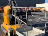 an image of a forklift parked in a parking lot
