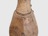 an image of a wooden vase on a white surface