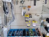 many different items on the shelf in the store