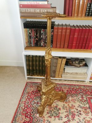 many books that are on the shelves in the room