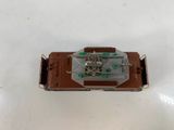 a close up of a toy car on a white surface