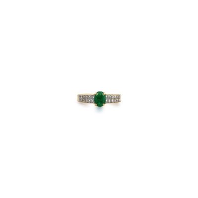 an emerald and diamond ring