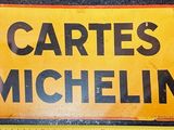 a yellow sign that says cartes michelin on it