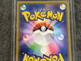 a close up of a card with a pokemon on it