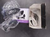 a box with a pair of headphones inside of it