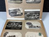 an old photo of an open book with pictures of ships on it