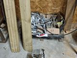 a pile of tools sitting on the floor in a room