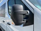 an image of a side view mirror of a van