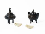 pair of chinese black lacquered caulds and a clove of cloves