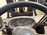 a close up of the steering wheel of a tractor