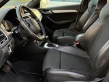 the interior of a white car with black leather seats and a steering wheel