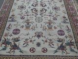 a large oriental rug on display in a store