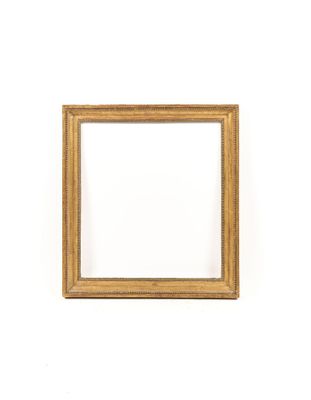 an old picture frame on a white wall with a white background