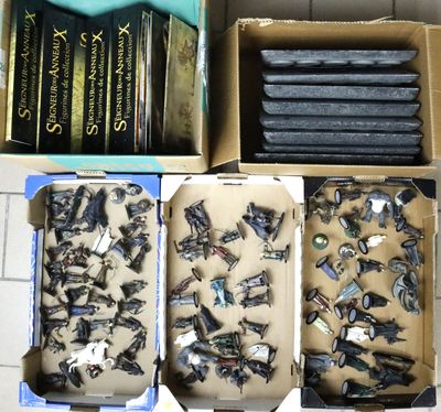 a lot of screws in a box on a table