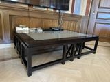 a glass table with a television on top of it