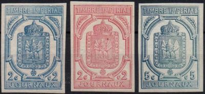 three different stamps of different colors and designs on a black background