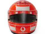 the helmet of michael schumacher, ferrari, is shown on a white background