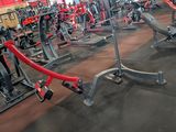 a gym with a lot of machines in the room