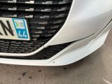 a close up of a car with a license plate on the front of it