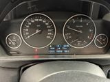 a close up of a car dashboard with various gauges