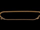 a close up of a gold chain on a black background