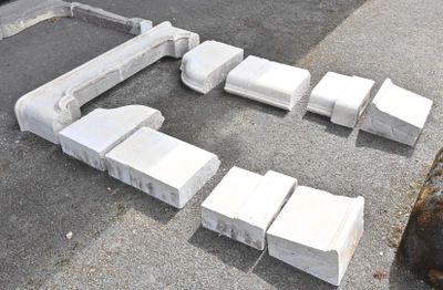 a lot of concrete blocks laid out on the ground