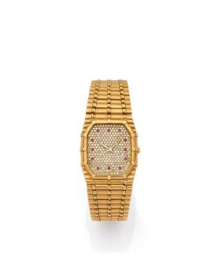 an 18k gold and diamond set wrist watch