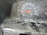 a close up of a car dashboard with a speedometer