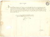 un vieux document sur lequel figure une lettre manuscrite au recto