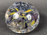 a close up of a glass object on a table