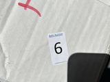 a cardboard box with a number six on it