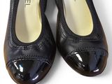 chanel black patent pumps with gold trims